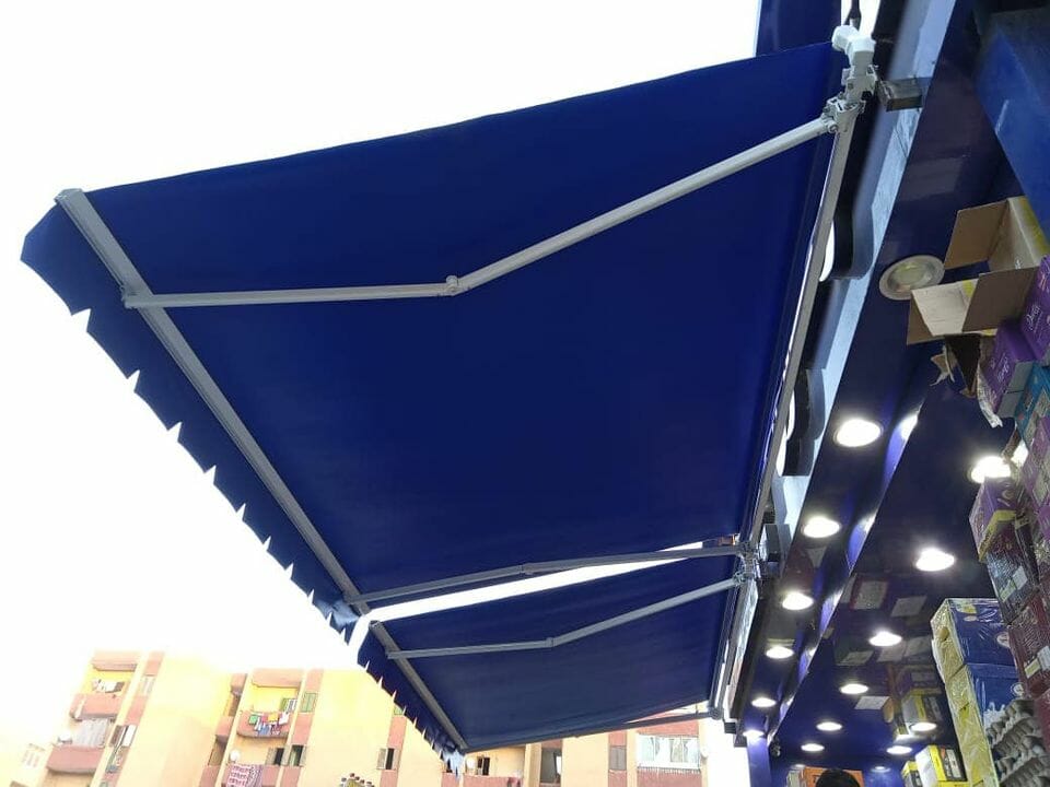 تركيب مظلات محلات متحركة 01555464501 23 تنده محل فرنساوي لون ازرق