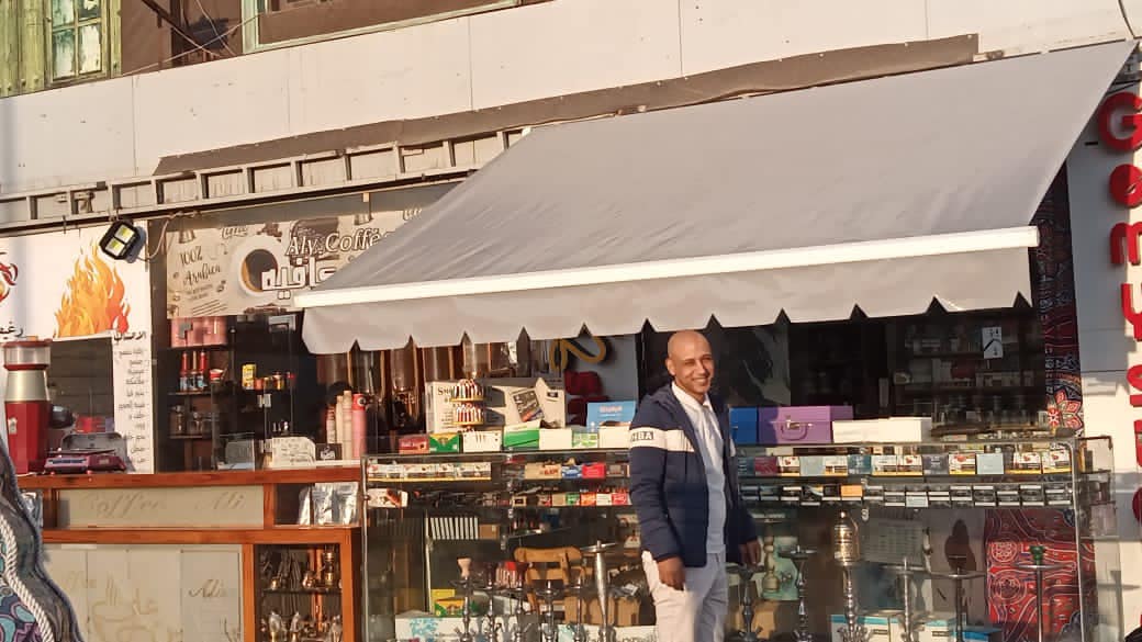 اشكال وأسعار المظلات المتحركة في مصر 01555464501 20 مظلات متحركة يدويا للمحلات