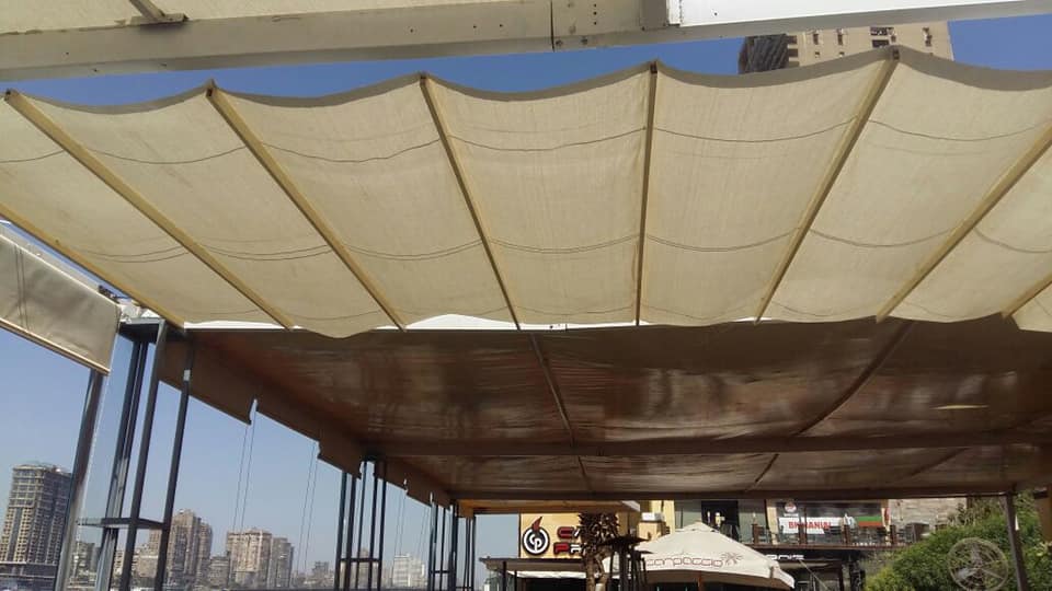 مظلات خارجية متحركة حديثة 01555464501 22 مظلات خارجية متحركة محلات سحابة يدوي