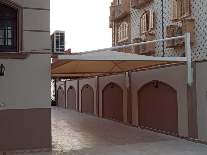 مظلات سيارات متحركة جاهزه 01555464501 12 تصاميم مظلات حديد مثبتة علي الحائط داخل المنزل