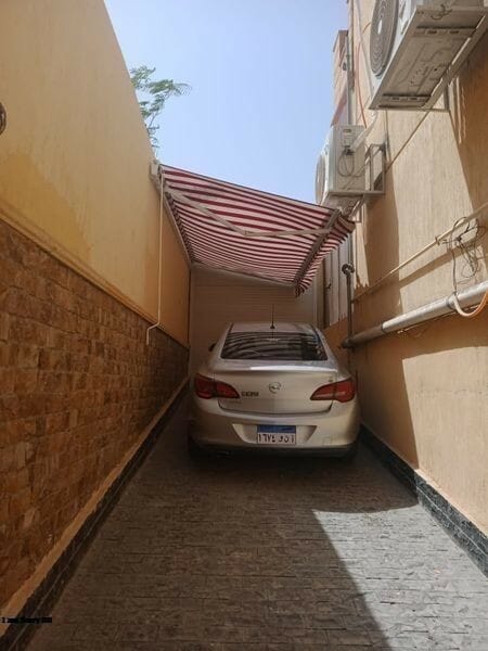 مظلات سيارات متحركة جاهزه 01555464501 2 تند فرنساوي للعربيات ثابته علي الحائط متحركة يدويا