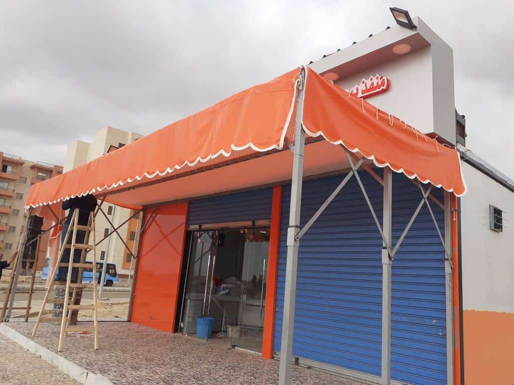 اشكال مظلات واجهات محلات والمطاعم 01555464501 16 مظلات معدنية للحماية من تغيرات الجو